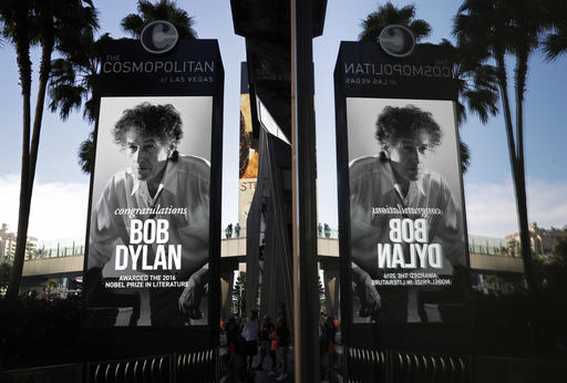 A sign outside of the Cosmopolitan of Las Vegas congratulates Bob Dylan