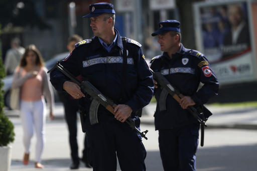 Bosnian policemen guard government buildings during the referendum in the Bosnian town of Banja Luka