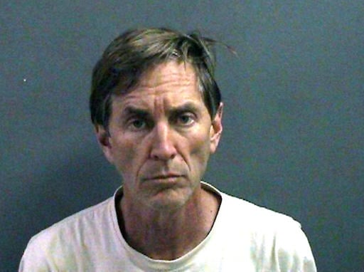 This undated booking photo provided by the Orange County District Attorney's Office shows Jeffrey Scott Jones