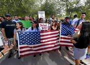 DACA supporters march to the Immigration and Customs Enforcement office to protest shortly after U.S. Attorney General Jeff Sessions' announcement that the Deferred Action for Childhood Arrivals (DACA)