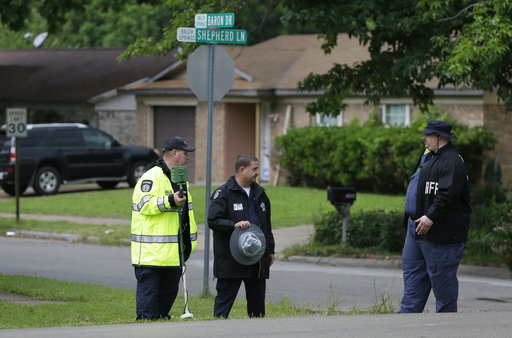 Dallas County Sheriff investigators finish up a follow up search for evidence at the intersection near where Jordan Edwards was killed by a police officer in Balch Springs