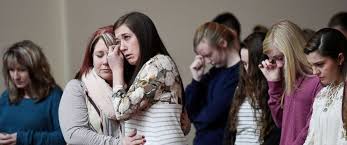 Grief-stricken people in Benton in Marshall County after school shooting 1-24-18