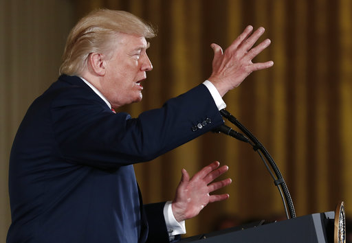 President Donald Trump speaks in the East Room at the White House in Washington