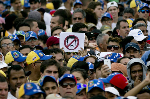 People protest against Venezuela's President Nicolas Maduro in Caracas