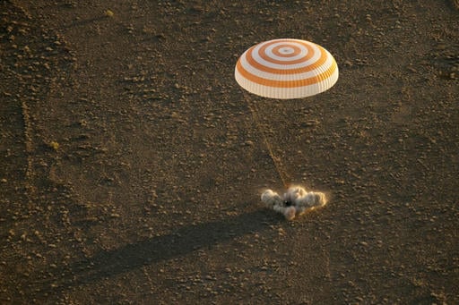 This photo provided by NASA shows the Soyuz TMA-20M spacecraft as it lands with Expedition 48 crew members NASA astronaut Jeff Williams