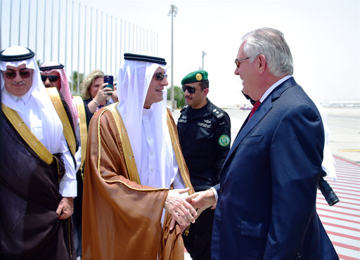 U.S. Secretary of State Rex Tillerson is greeted by Saudi Foreign Minister Adel al-Jubeir upon his arrival in Jiddah