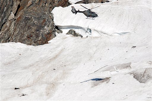 A military helicopter flies above the Chelengletscher glacier in Goeschenen