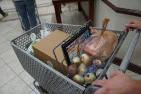 God's Pantry Food Bank in Lexington 'Sharing Thanksgiving' distribution where it feeds eligible families in Fayette County