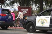 People walk to the information center at the Veterans Home of California in Yountville