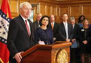 Gov. Asa Hutchinson speaks at a news conference Monday