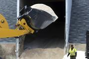 Streets Department crews load rock salt in preparation for an expected winter snowstorm in Philadelphia