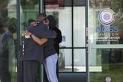 Cynthia Brown is hugged by a member of the Bayside of South Sacramento Church