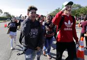 Students walk out of Marjory Stoneman Douglas High School