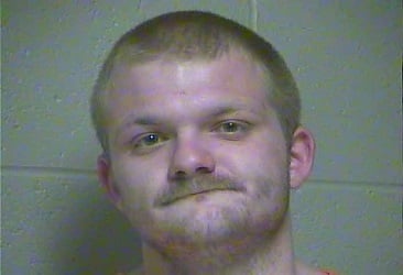Blue mask burglary suspect accused of stealing donation boxes from ACE Hardware in Versailles.
