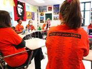 Students discuss gun violence ahead of a walkout at East Chapel Hill High School on Wednesday