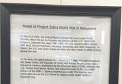 A framed description of "Project Zebra" hangs on the wall of the Arts of the Albemarle building in Elizabeth City