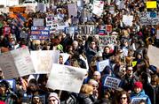 People take part in a march rally against gun violence Saturday