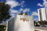 Six crosses are placed at a makeshift memorial on the Florida International University campus in Miami on Saturday