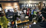 Demonstrators occupy the Starbucks that has become the center of protests Monday