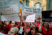Teachers from across Kentucky gather inside the state Capitol to rally for increased funding for education