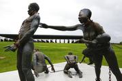 Part of a statue depicting chained people is on display at the National Memorial for Peace and Justice