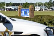 A police vehicle sits outside the Lee Correctional Institution on Monday