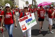 Thousands march to the Arizona Capitol for higher teacher pay and public school funding on the first day of a state-wide teachers strike Thursday