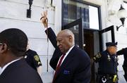 Bill Cosby gestures after being convicted of drugging and molesting a woman