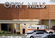 An ambulance sits outside Opry Mills mall Thursday