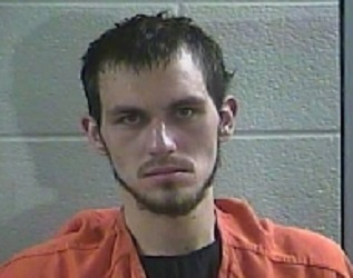 Brandon Curtis is accused of stabbing a woman at a truck stop in Corbin.