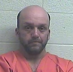 Xandor Reign is accused of trying to start a fire at a home in Nicholasville with people inside.