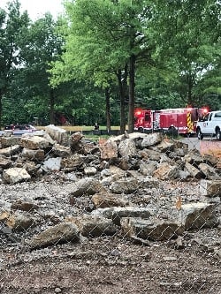 Dump truck driver killed after his truck hits power lines near Squires Road.