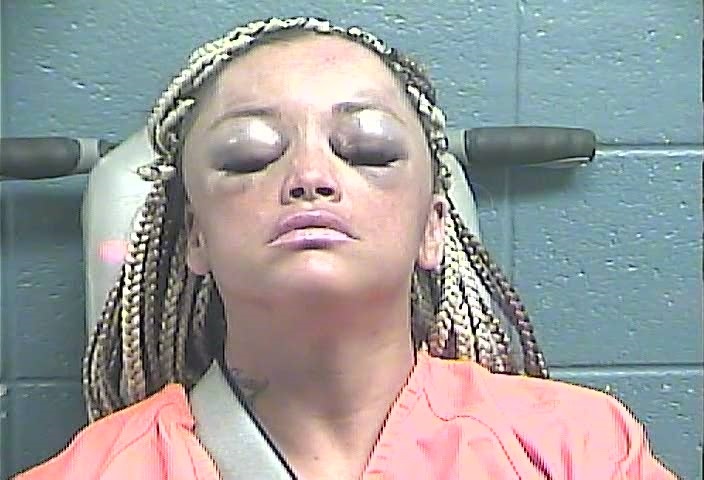 Charged with hitting a Jessamine County Sheriff's deputy's cruiser in Nicholasaville.