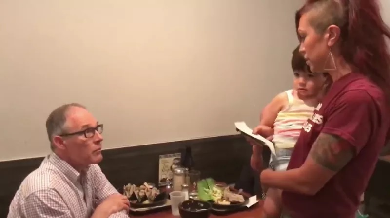Kristin Mink confronts EPA Chief Scott Pruitt at a Washington D.C. restaurant.