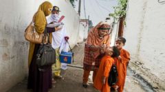PHOTO: Polio vaccines are administered to some children.