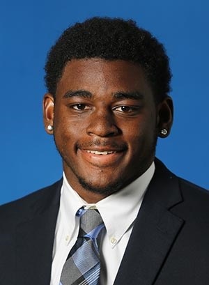 UK linebacker diagnosed with malignant melanoma.