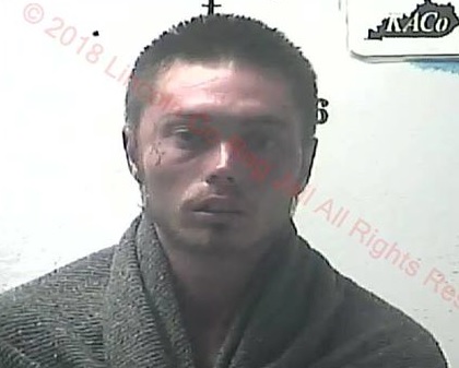 Garrard County man  accused of headbutting an officer and trying to headbutt and bite another.