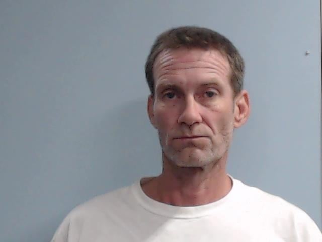New mug shot for murder suspect.  Accused of killing Peter Lian.