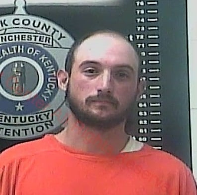Winchester man charged with murder for watching his mother kill herself.