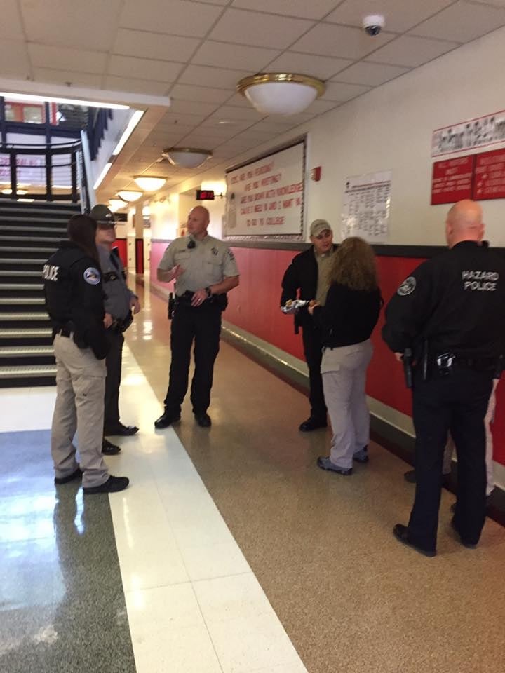 Authorities inspecting Perry County High School after a bomb threat.
