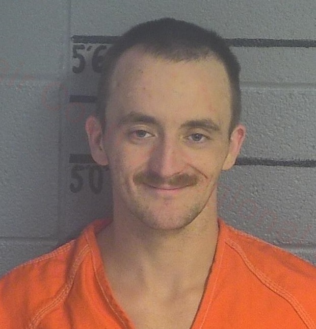 Adair County escapee caught  after running away during trip to court.