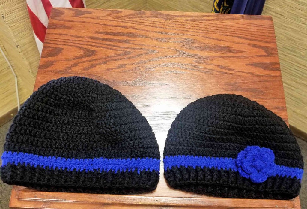 Woman crocheted 70 handmade "Thin Blue Line" toboggans and donated them to the Laurel County Sheriff's Office 12-18-18