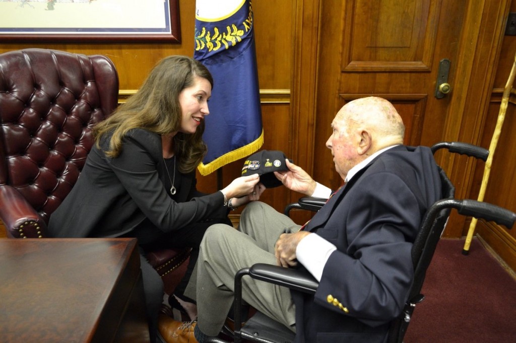 Alison Lundergan Grimes with retired Lieutenant Colonel William Pollard.