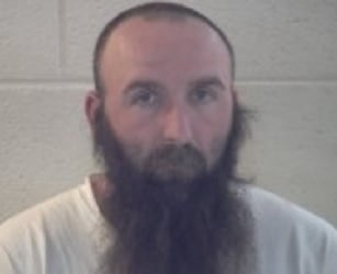 Suspect in armed robberies at Apple Wine and Spirits and Cash Express in Pulaski County.