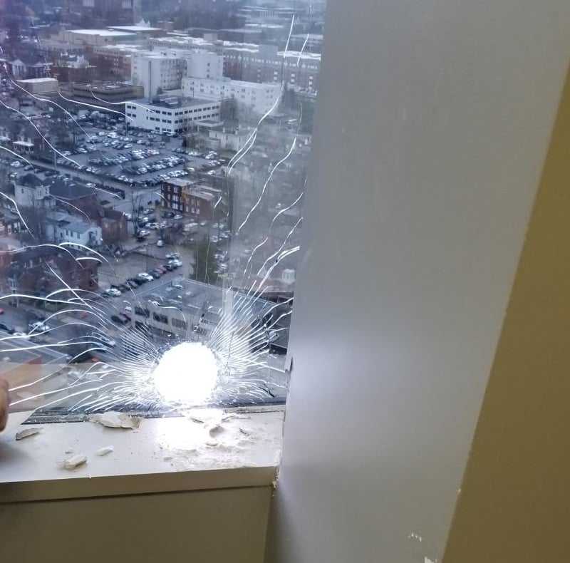 Employees find bullet hole in window on 25th floor of the Fifth Third building downtown.