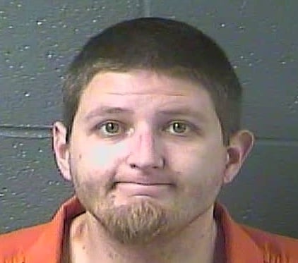 Charged with stabbing in Harrodsburg.