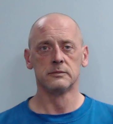 Accused of setting fire in his apartment on Dinsmore Drive.
