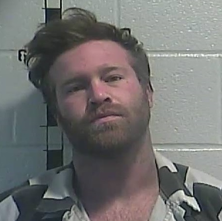 Found sleeping in truck in Anderson County with blasting caps and meth.