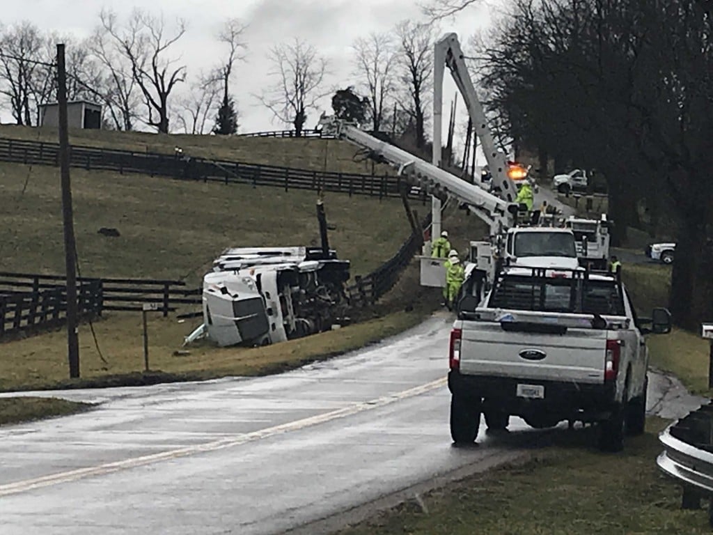 Semi truck overturns on Pinckard Pike in Woodford County.