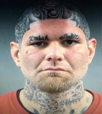 Arrested in Bowling Green. Has Irish Pride tattooed above his eyebrows.